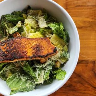 Caesar salad with salmon