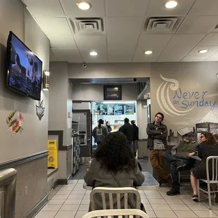 people sitting in a waiting area