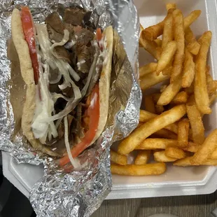 Gyro sandwich, fries  to go. So good!