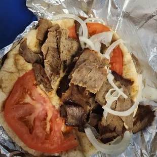 a meat and tomato pita