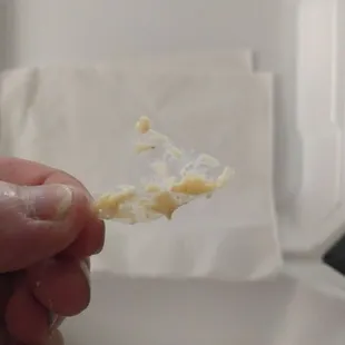 Plastic mixed in with the hummus.