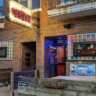 Bar entrance with outdoor tables