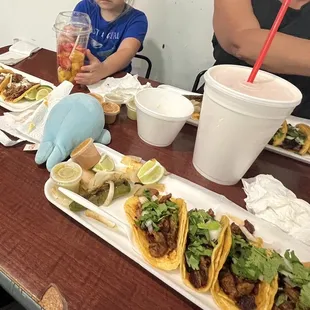 El pastor and Barbacoa tacos and fruit cup