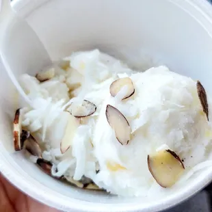Pineapple Icecream with coconut and almond flakes!! Soo good! Right after a workout