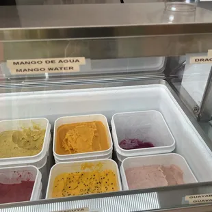 a display of different flavors of ice cream