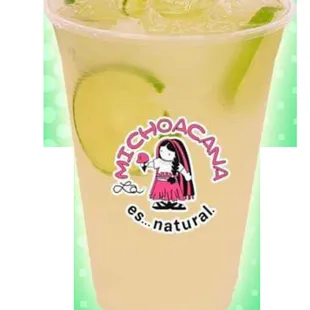 a drink with lime slices