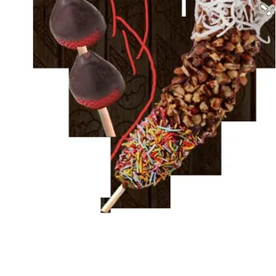a skewer of chocolate and sprinkles