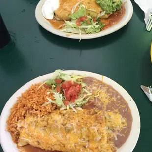 #1 is a burrito with rice and beans alongside. #15 is a burrito with rice and beans on the inside. Same price, but #15 includes guac!