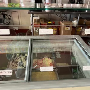 a display case filled with food