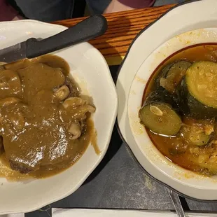 wo plates of food on a table