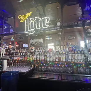 the neon sign above the bar