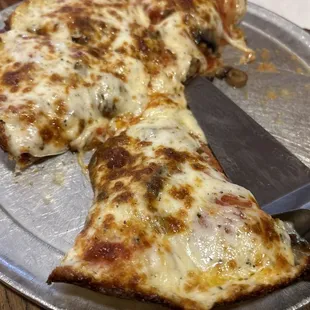 Cheesy cheesy pepperoni roundhouse pizza ..