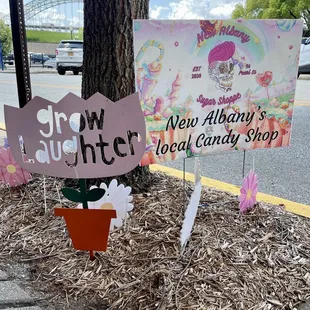 a sign for the new albany's local candy shop