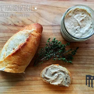 a baguet and a jar of butter