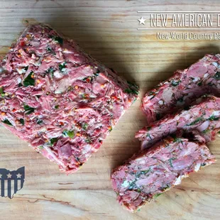 sliced meat on a cutting board
