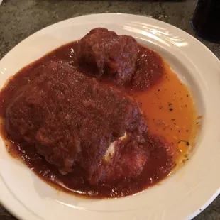 My lasagna with a side of a huge meatball. Definitely worth getting