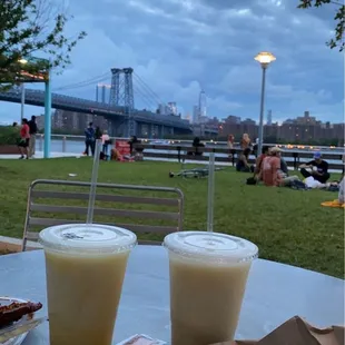 a plate of food and a drink on a table