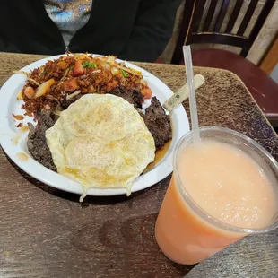 Steak and eggs mix fried rice with a watermelon coloda this dish and drink tasted amazing tasted way better than other coloda I tried.
