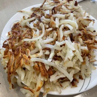 Hash browns. I barely touched it. I prefer a crispier hash brown. Overall a meh. Dry and flavorless.