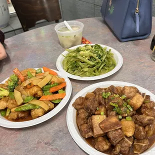 Sautéed water spinach (back), fuzhuo style spare ribs with taro (right), sweet and sour sliced fish (left)
