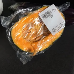 a pumpkin wrapped in plastic