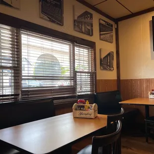 a table and chairs in a restaurant