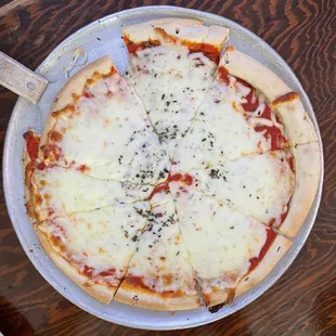 Disgusting cheese pizza on pre frozen crust