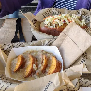 German Potato Salad and a Chicken Apple wurst with caramelized onions and slaw.