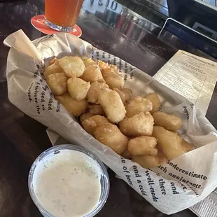 Happy hour cheese curds with herb ranch