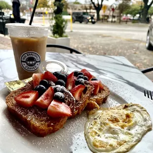 French toast w/ berries and a friend egg.  Iced dirty chi.