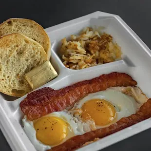 Traditional Breakfast -
Two eggs. Hash browns, toast &amp; choice of Protein
