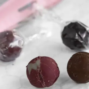 House-Made Chocolate Candies
Callebaut Belgium Chocolate
Cherry Bombs - Candied Amarena Cherry in Ruby Red, Milk &amp; Dark Chocolate