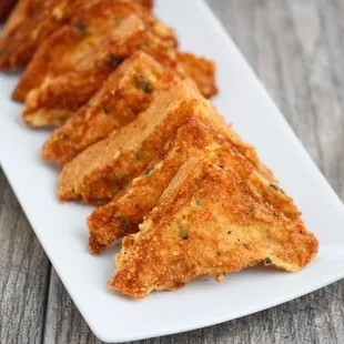 a plate of fried tofu