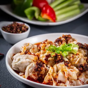 Up for a bit of spicy? Try our wonton in spicy chili sauce