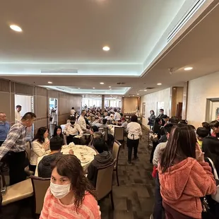 a large group of people eating
