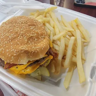 Double bacon cheese burger  and fries.  Not bad. Pretty juicy Burger.