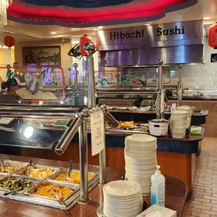 a buffet with a variety of food items