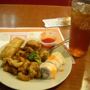 Buffet wares with a tall sweet iced tea.