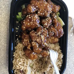 Sesame Chicken with Fried Rice: chicken over fried and rice very bland lacking any real flavor. Two thumbs down.