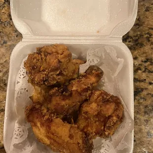 fried chicken in a styrofoam container