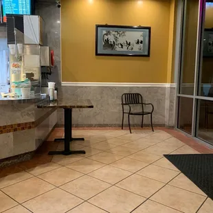 empty table and chairs in a restaurant