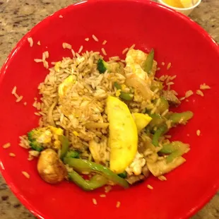 Hibachi station: rice, egg, squash, onion, bell pepper, mushroom, broccoli, steak cubes and soy sauce
