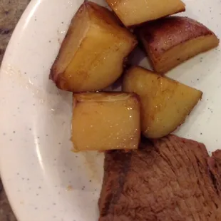 Beef Roast with potatoes. Meat is fork tender and very tasty, but potatoes are fighting back, need a little more cook time.