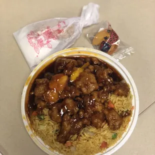 Orange chicken lunch special with rice and egg roll...$5.57 after tax.