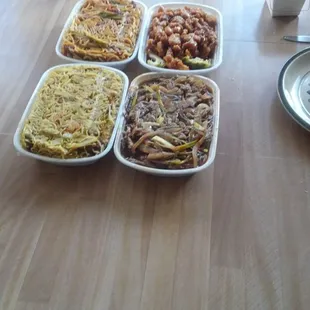 Singapore mei fun, pork lo mein, Mongolian beef, and General Tso&apos;s chicken brought home for dinner