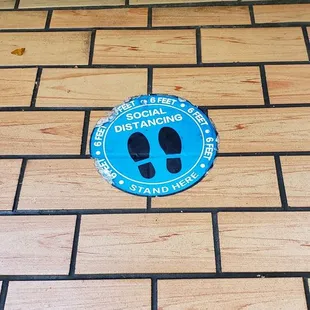 a blue sign on the floor