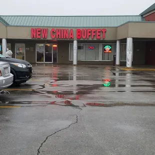 parking lot with cars parked in front