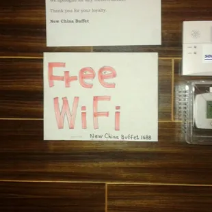a free wifi sign on the wall