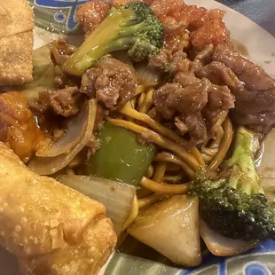 Lo mein egg rolls pepper steak