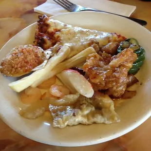 Round 2 Seafood, fries, Chinese &quot;pizza&quot; shrimp broccoli gen tso chicken.